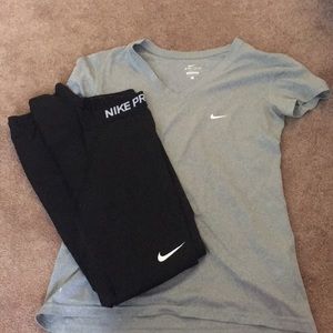 Gray nike shirt and black nike leggings